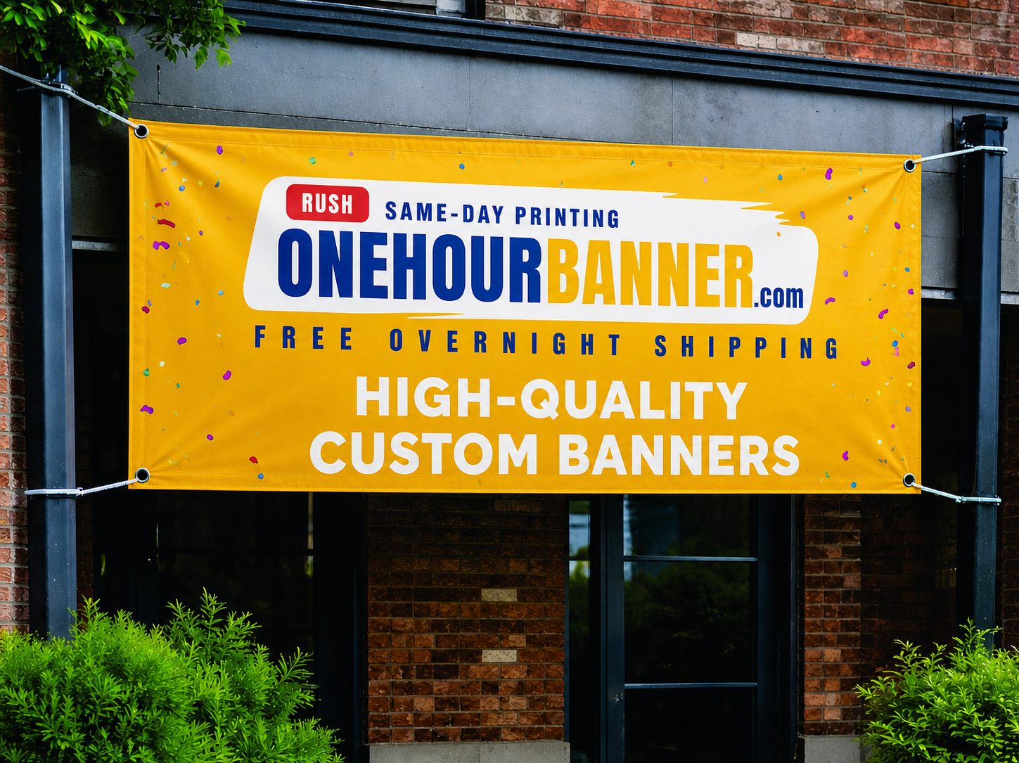 Yellow custom vinyl banner with ONEHOURBANNER.com logo — high-quality same-day printing